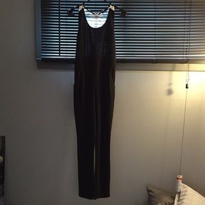 Black jumpsuit with white lace back